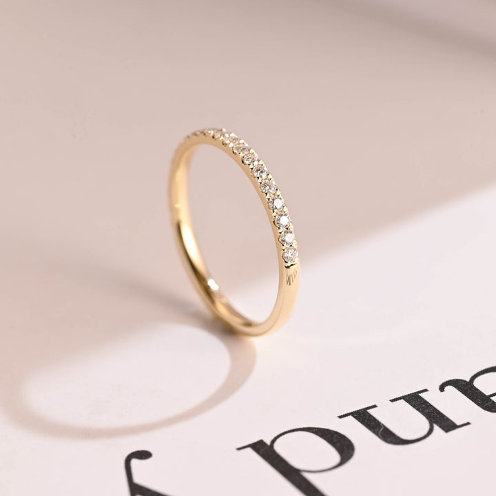 Side view of round diamond wedding band