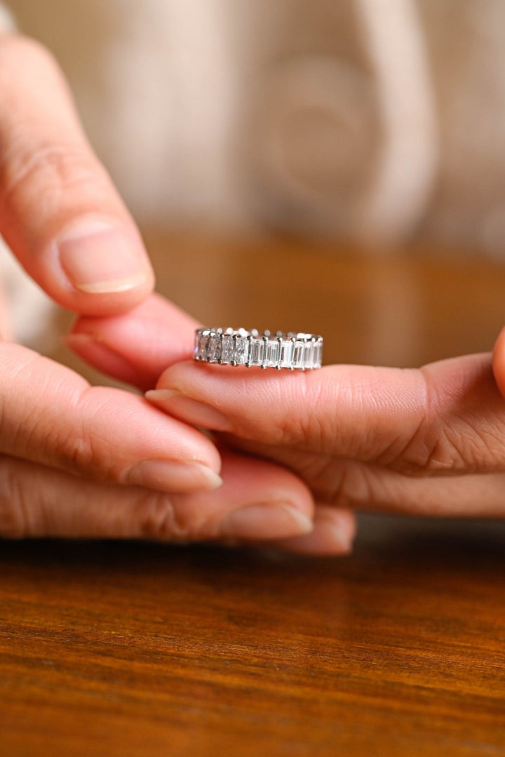 Emerald & Radiant diamond band stacked with engagement ring