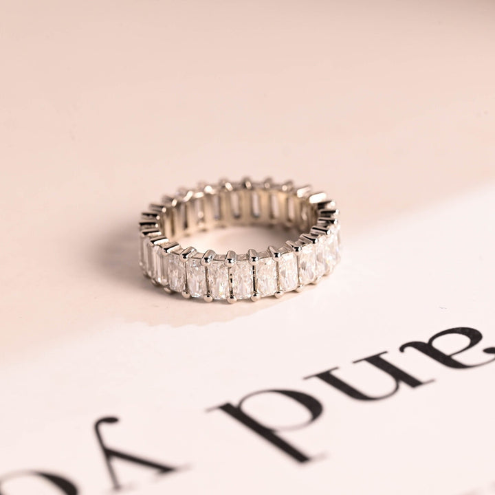 Ethically sourced emerald & radiant diamond eternity band