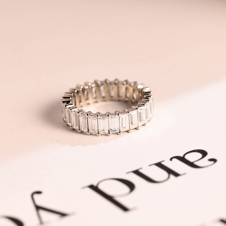 Emerald & Radiant diamond wedding band in yellow gold