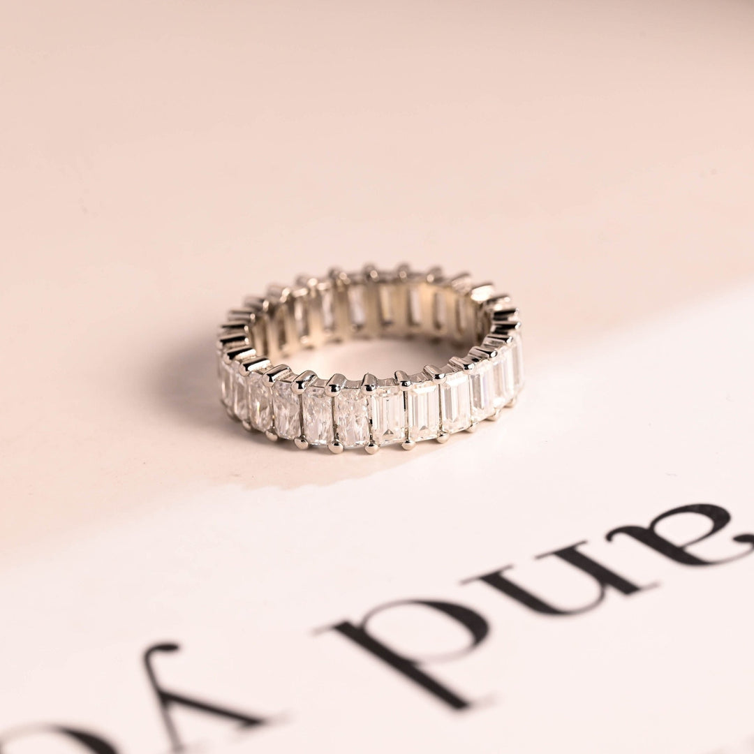 Emerald & Radiant diamond wedding band in white gold