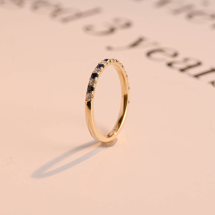 Round diamond band stacked with engagement ring