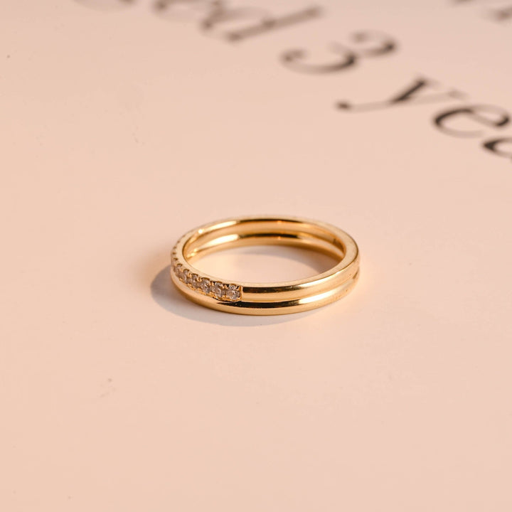 Round diamond band stacked with engagement ring