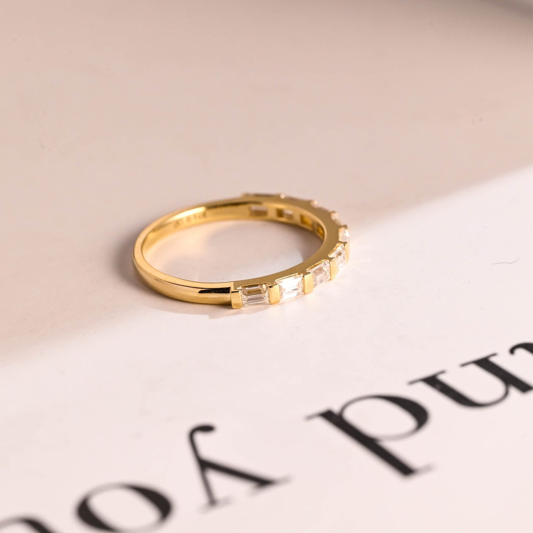 Baguette diamond wedding band in rose gold