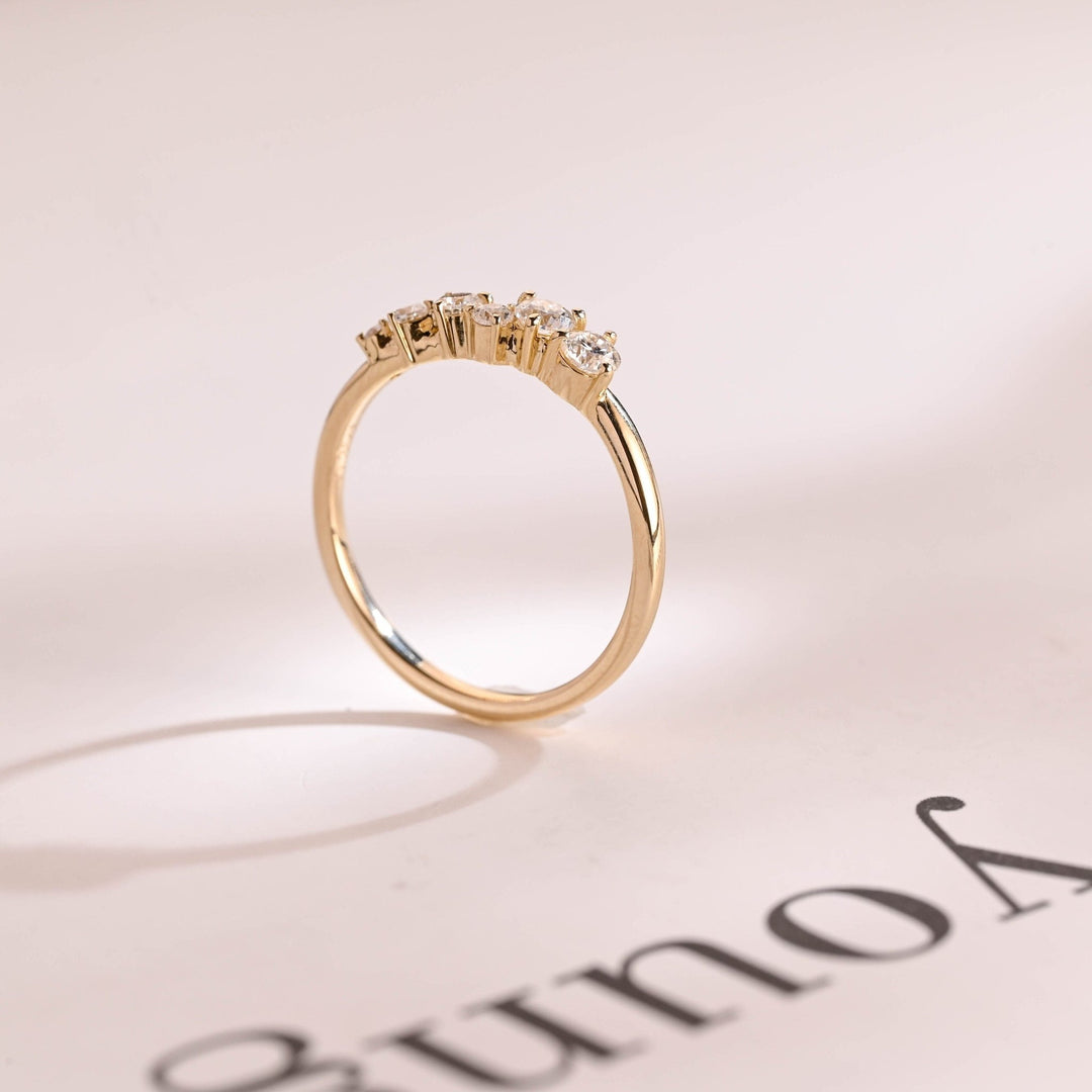 Round diamond wedding band in rose gold