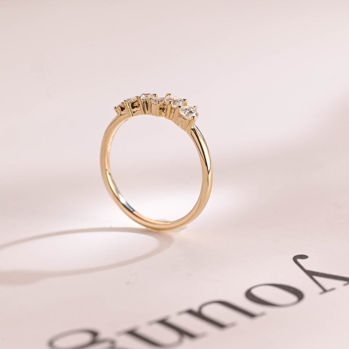 Round diamond wedding band in rose gold