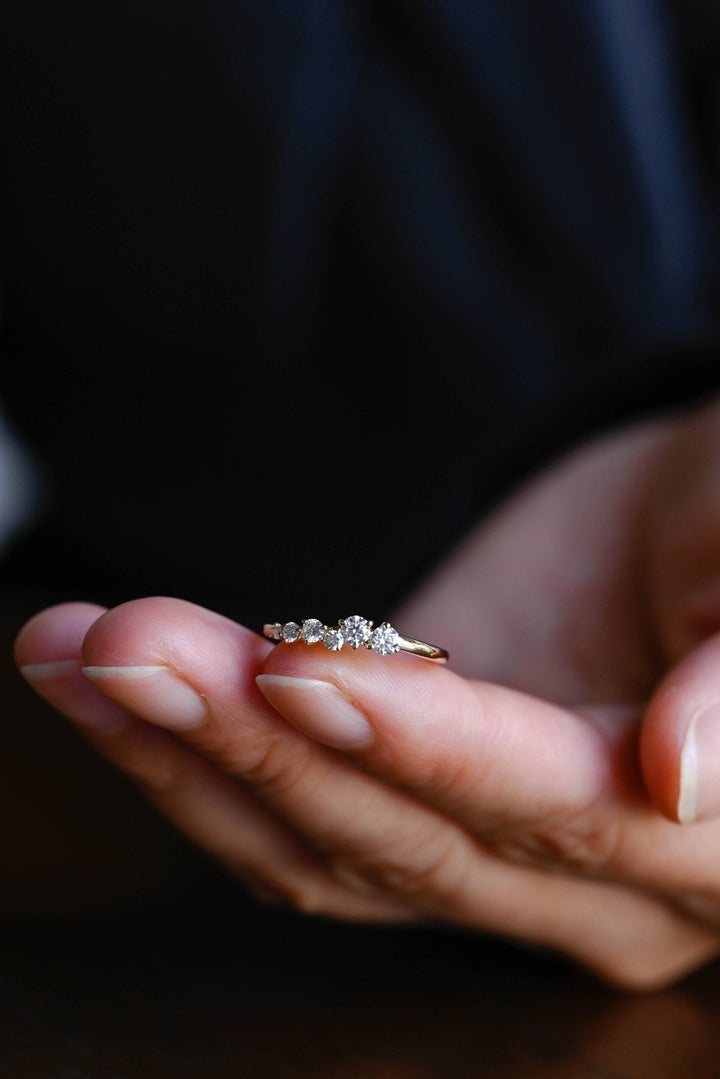 Side view of round diamond wedding band