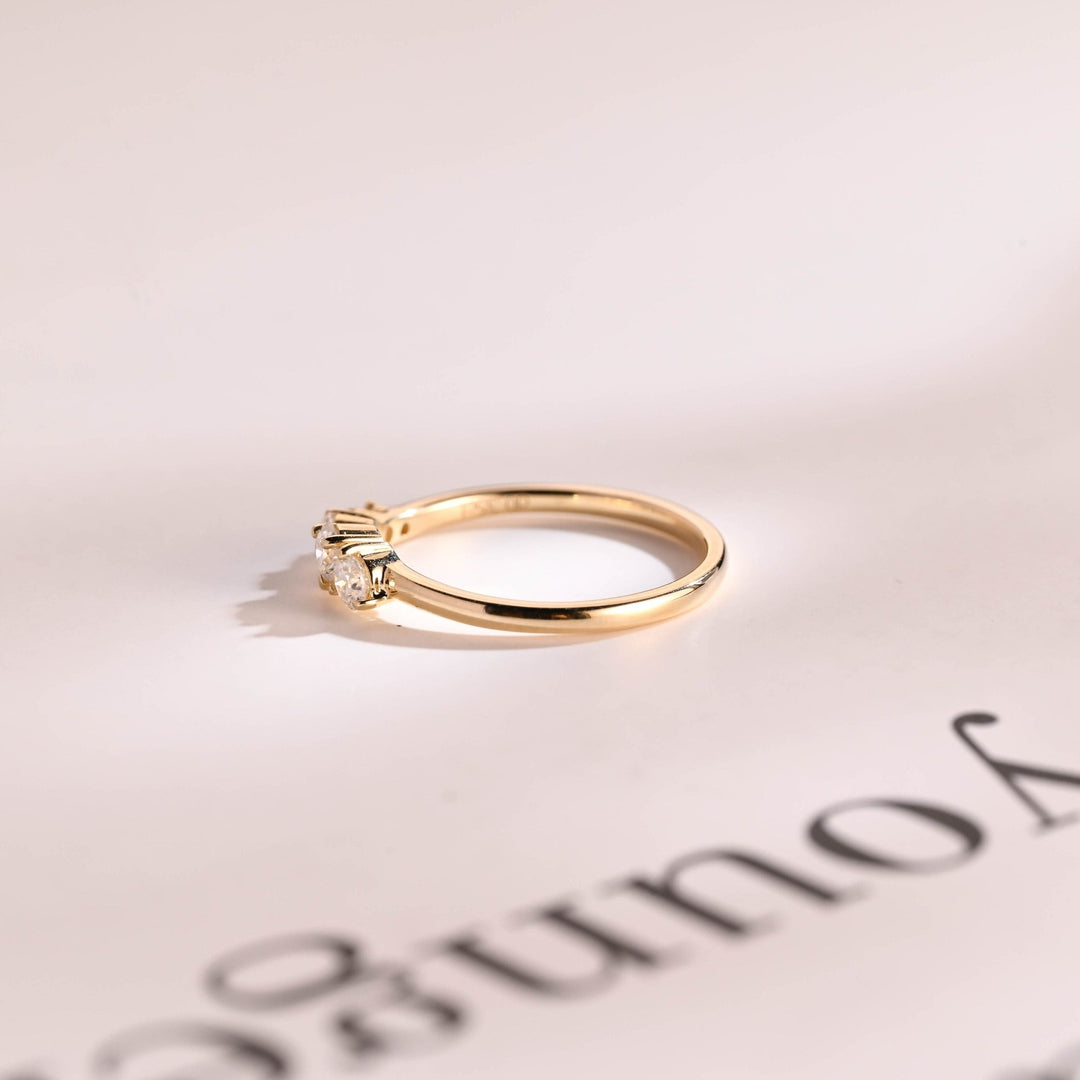 Round diamond band stacked with engagement ring