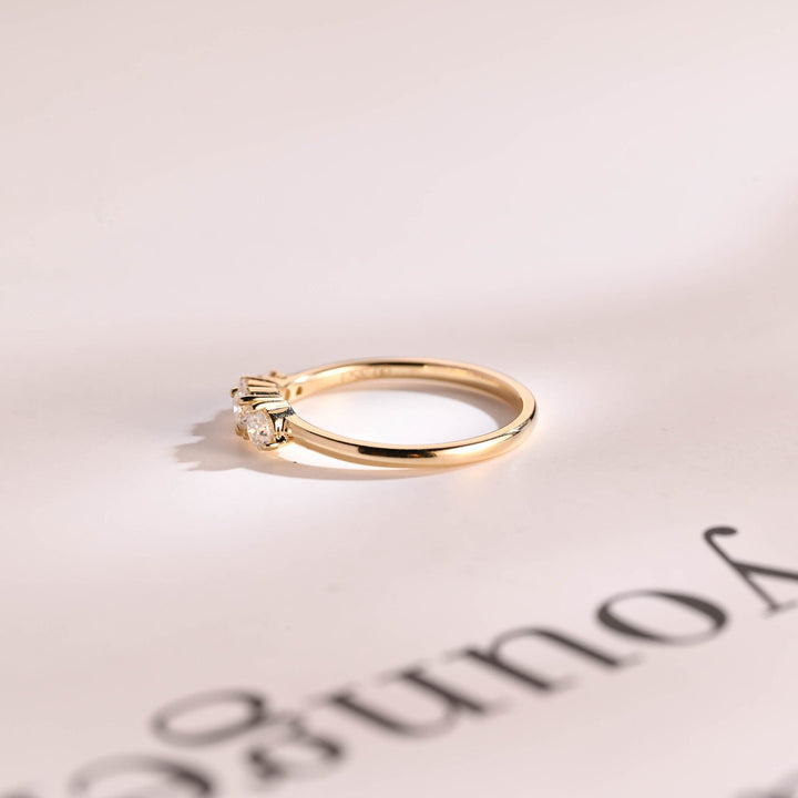 Round diamond band stacked with engagement ring