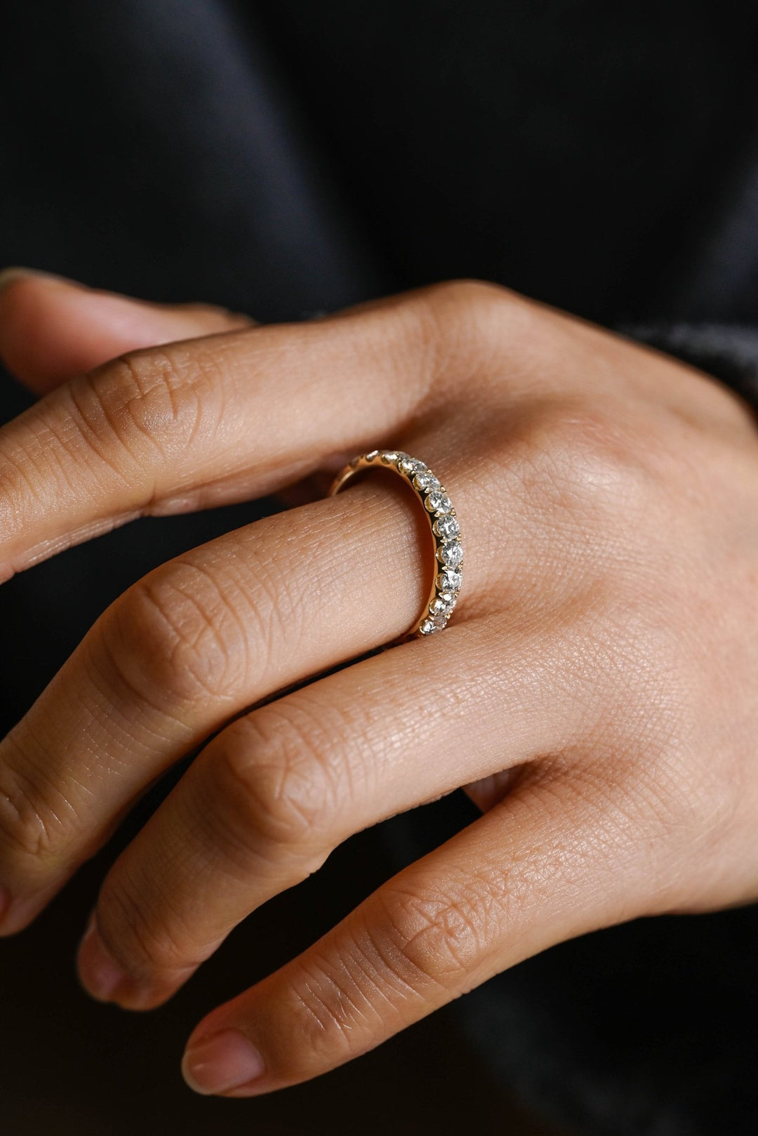 Round diamond band stacked with engagement ring