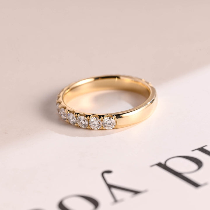 Round lab grown diamond band worn on hand