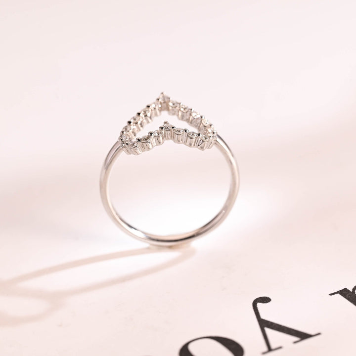 Round diamond wedding band in rose gold