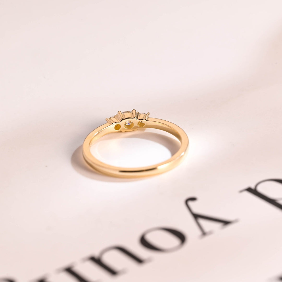Side view of round diamond wedding band