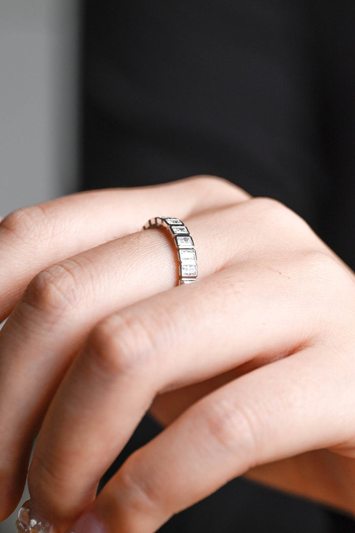 Radiant diamond band stacked with engagement ring
