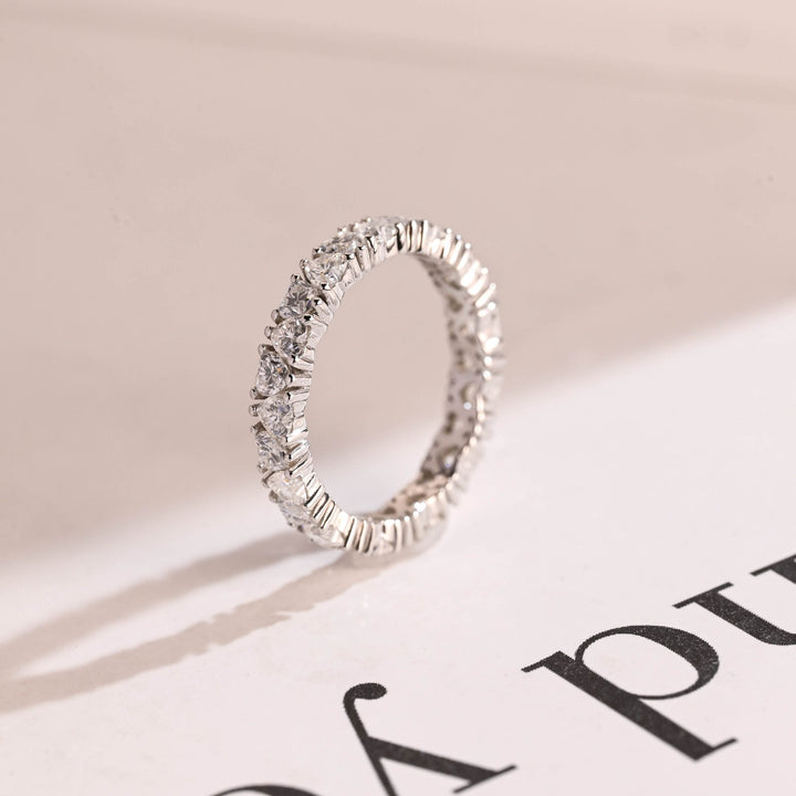 Side view of heart diamond wedding band