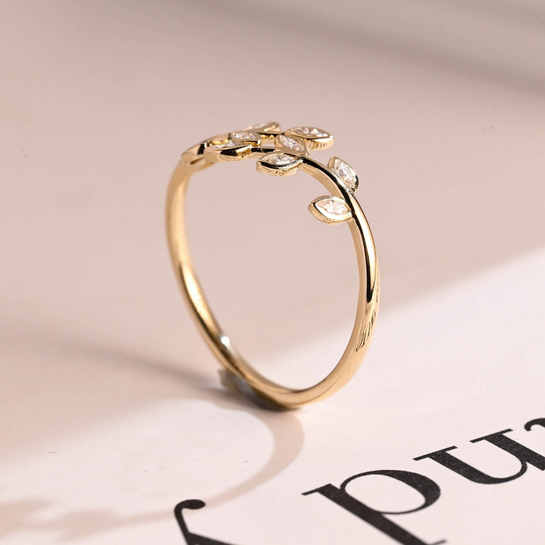Marquise diamond wedding band in yellow gold