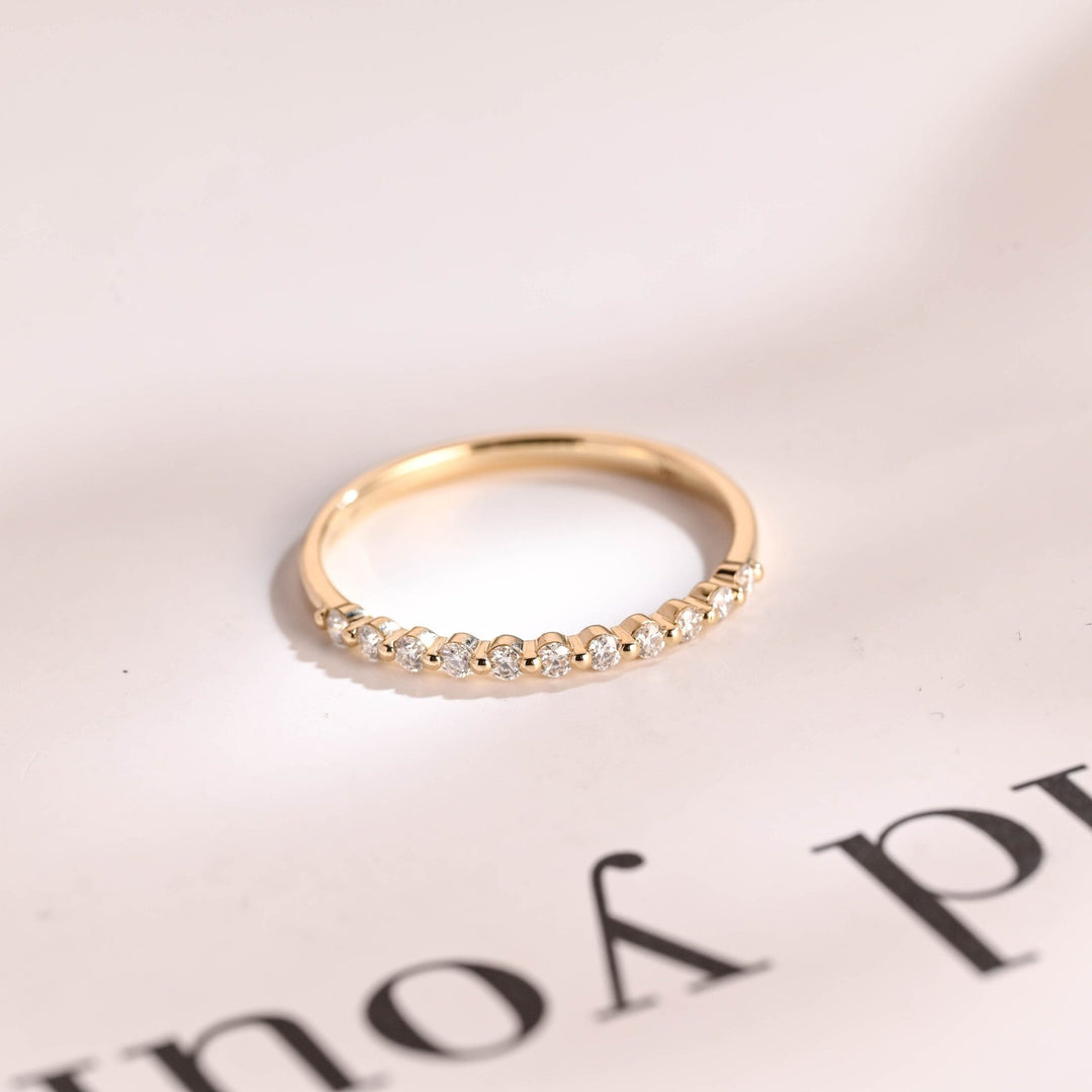 Side view of round diamond wedding band
