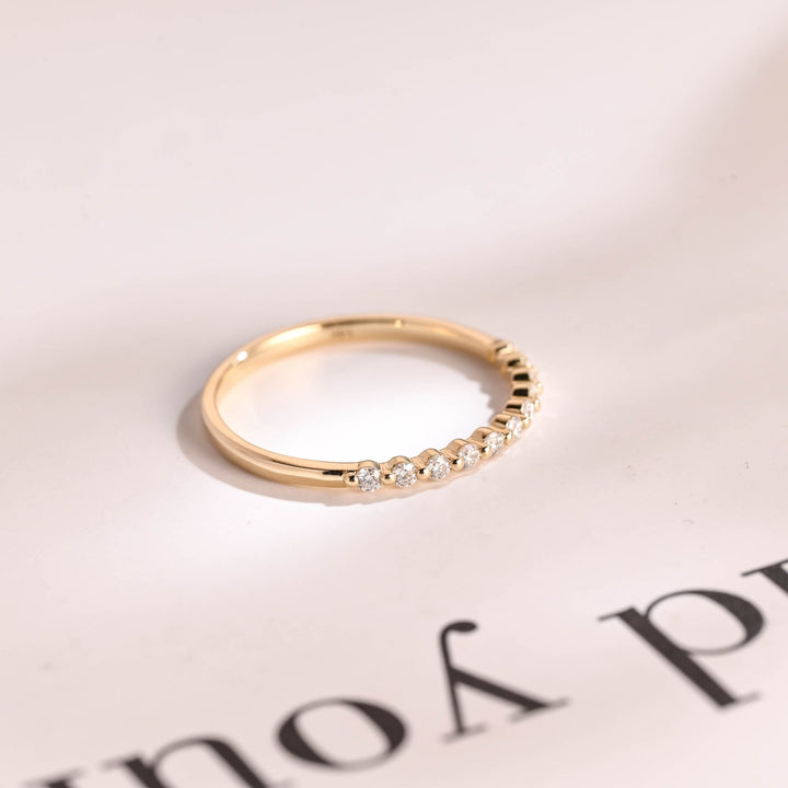 Round lab grown diamond band worn on hand