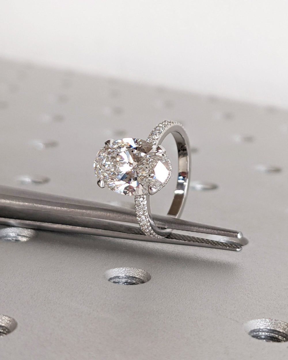 Shop oval cut hidden halo lab grown diamond engagement ring online