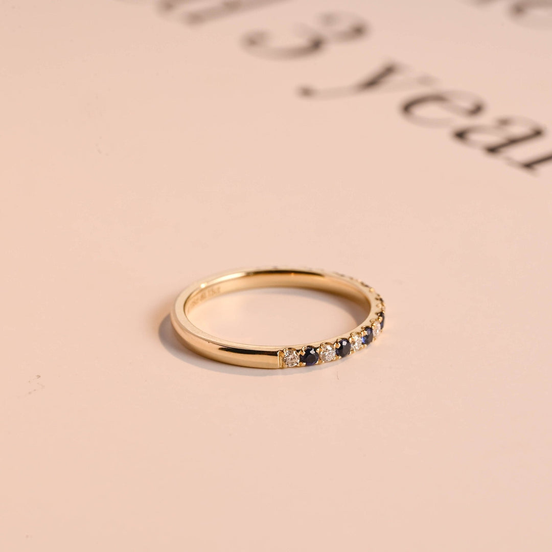 Round diamond wedding band in rose gold