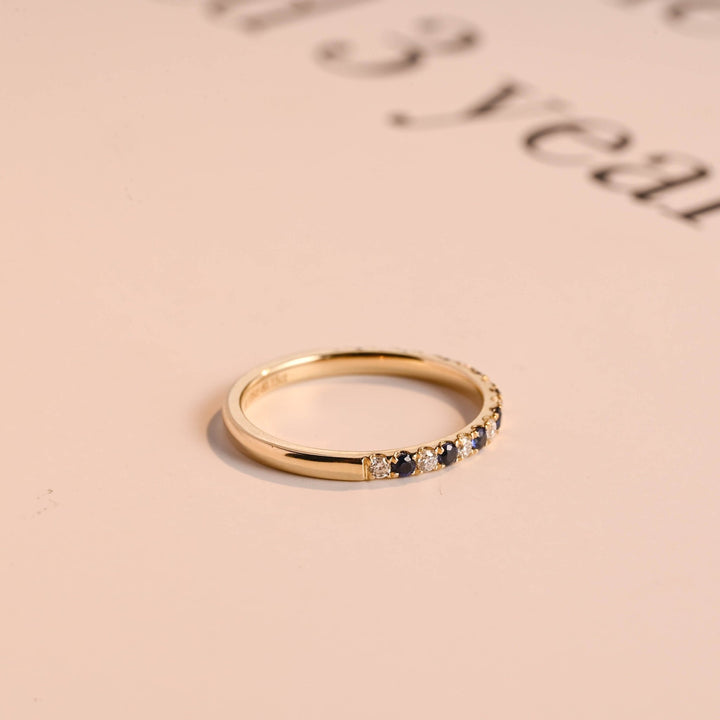 Round diamond wedding band in rose gold