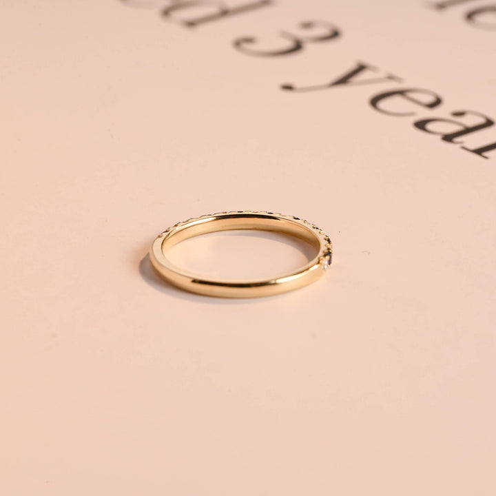 Side view of round diamond wedding band