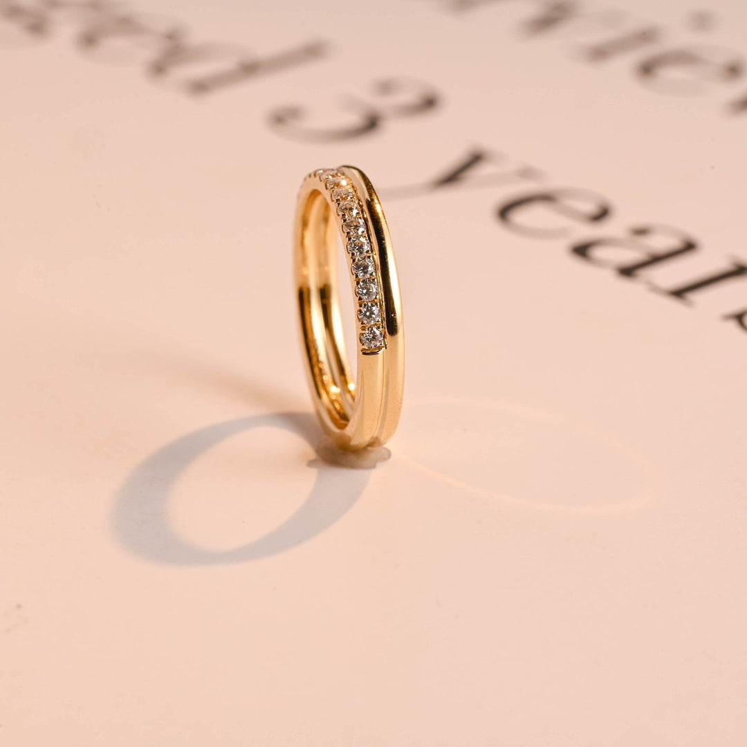 Round diamond wedding band in rose gold