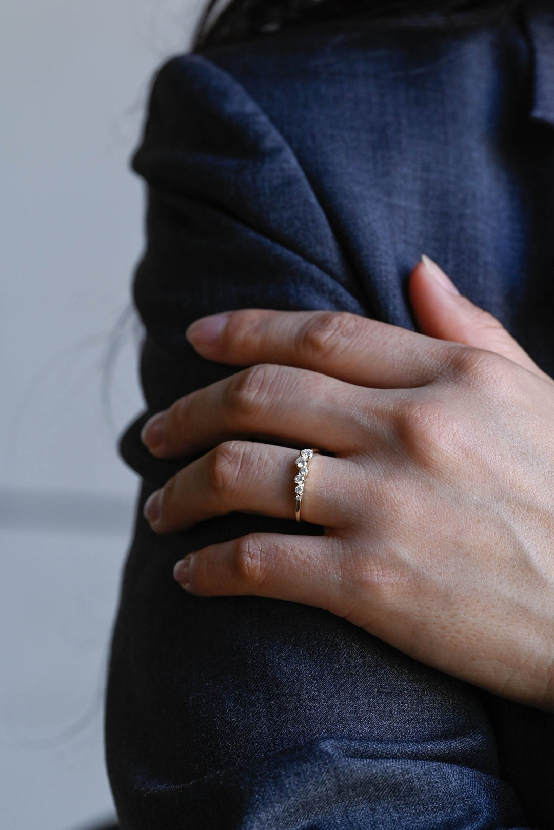 Round lab grown diamond band worn on hand