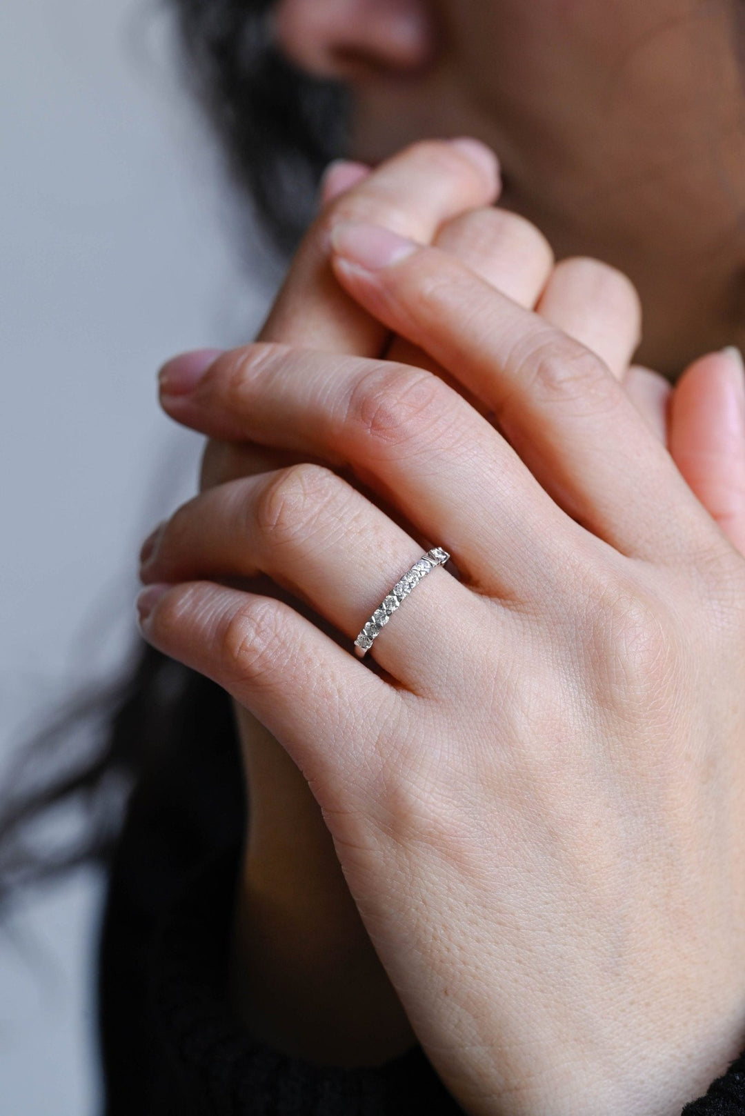 Round lab grown diamond band worn on hand