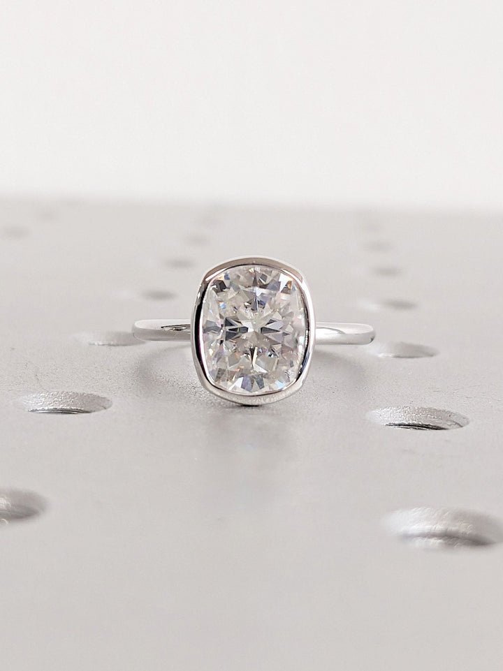 Top-down view of cushion cut bezel engagement ring