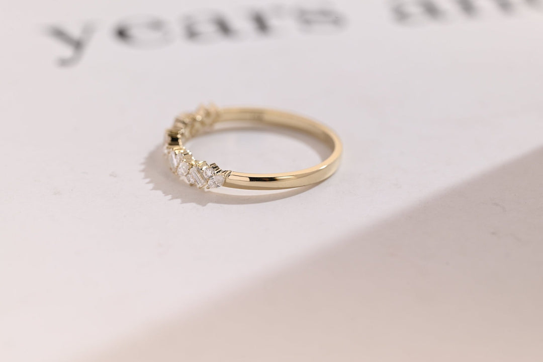 Mix Stone diamond band stacked with engagement ring