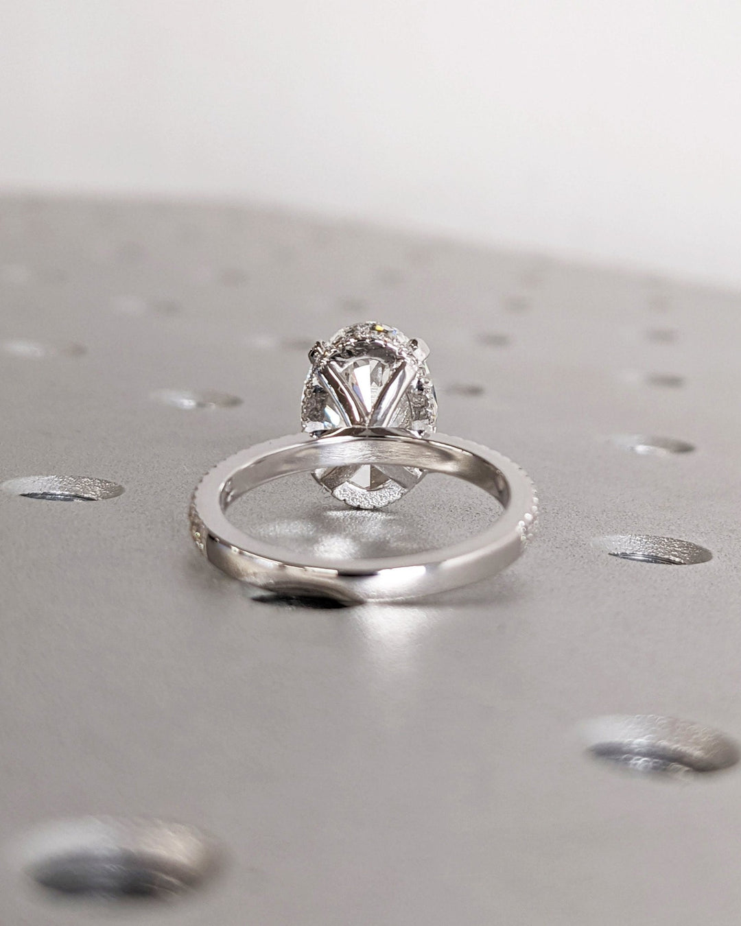 Shop the oval cut hidden halo engagement ring collection online