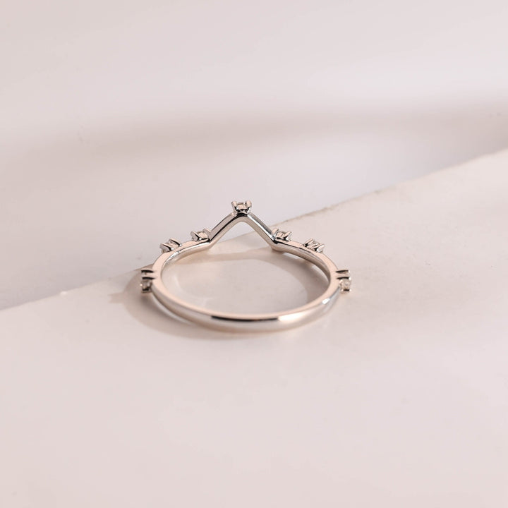 Round diamond wedding band in rose gold