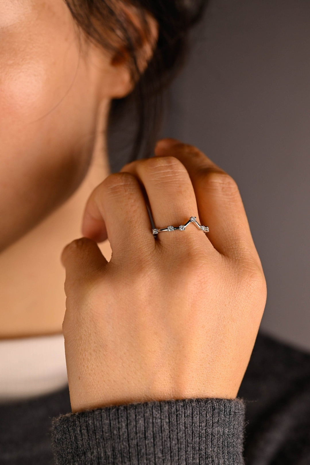 Side view of round diamond wedding band