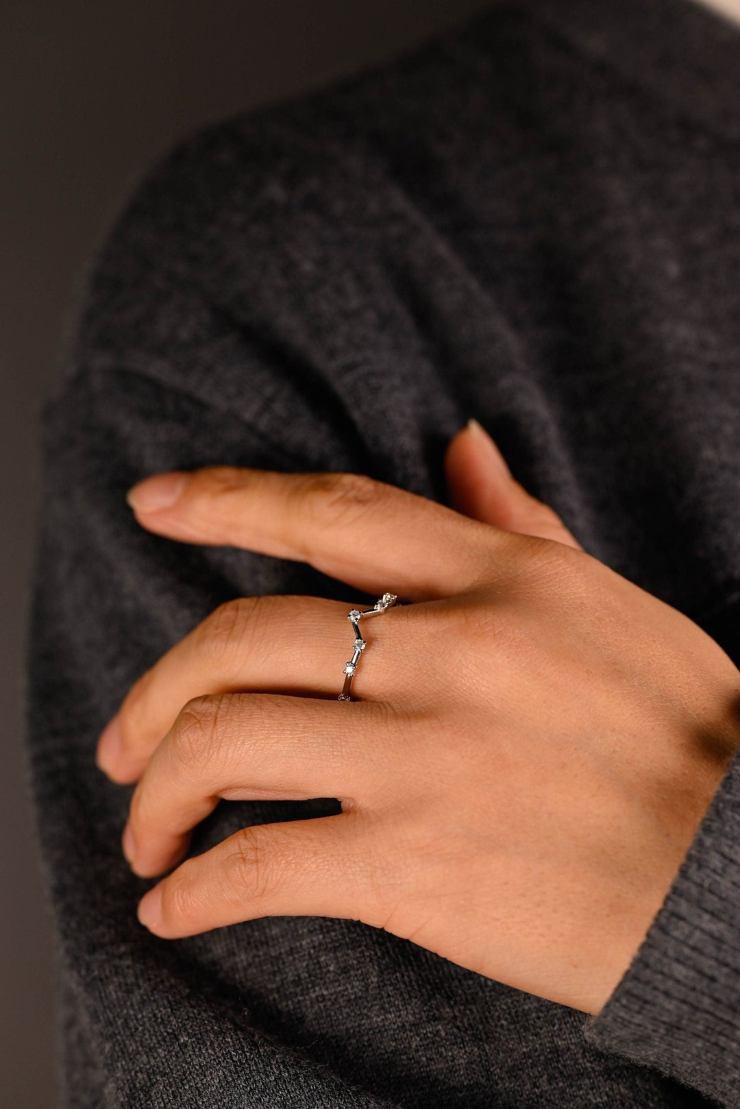 Round lab grown diamond band worn on hand