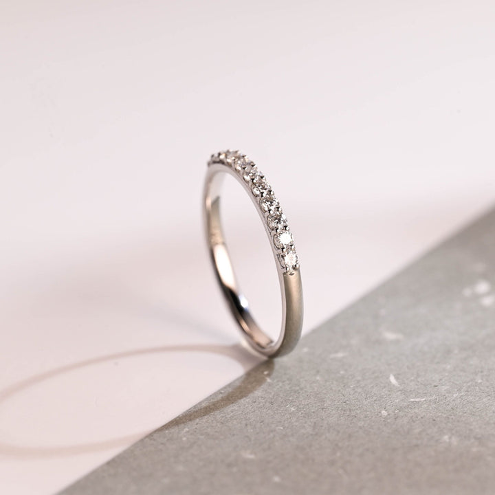 Side view of round diamond wedding band