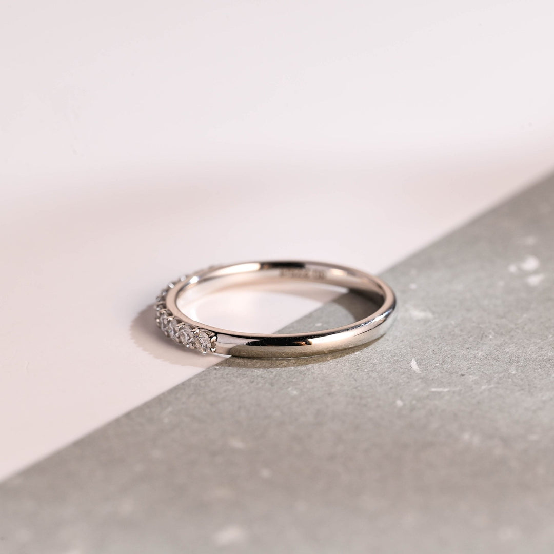 Round lab grown diamond band worn on hand