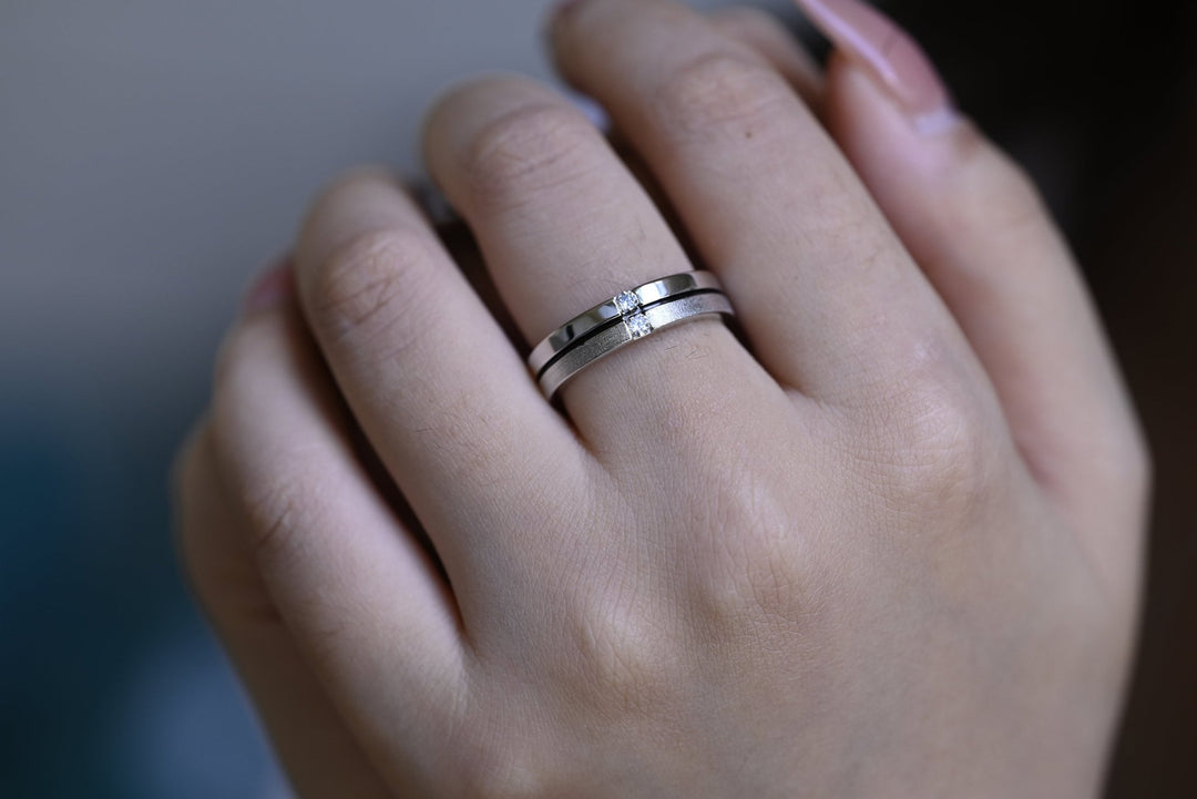 Round diamond wedding band in rose gold