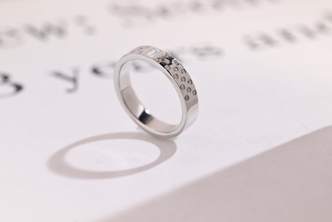 Ethically sourced round & emerald diamond eternity band