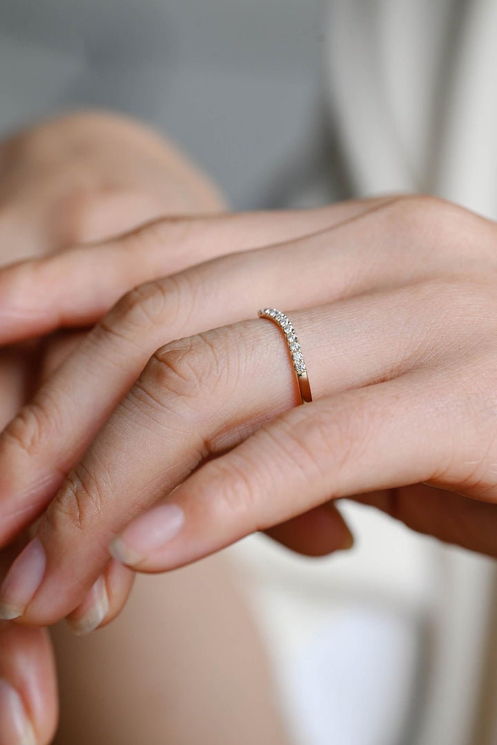 Round diamond band stacked with engagement ring