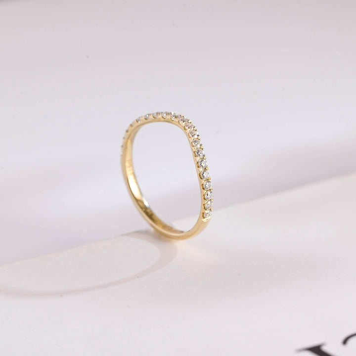 Round diamond wedding band in rose gold