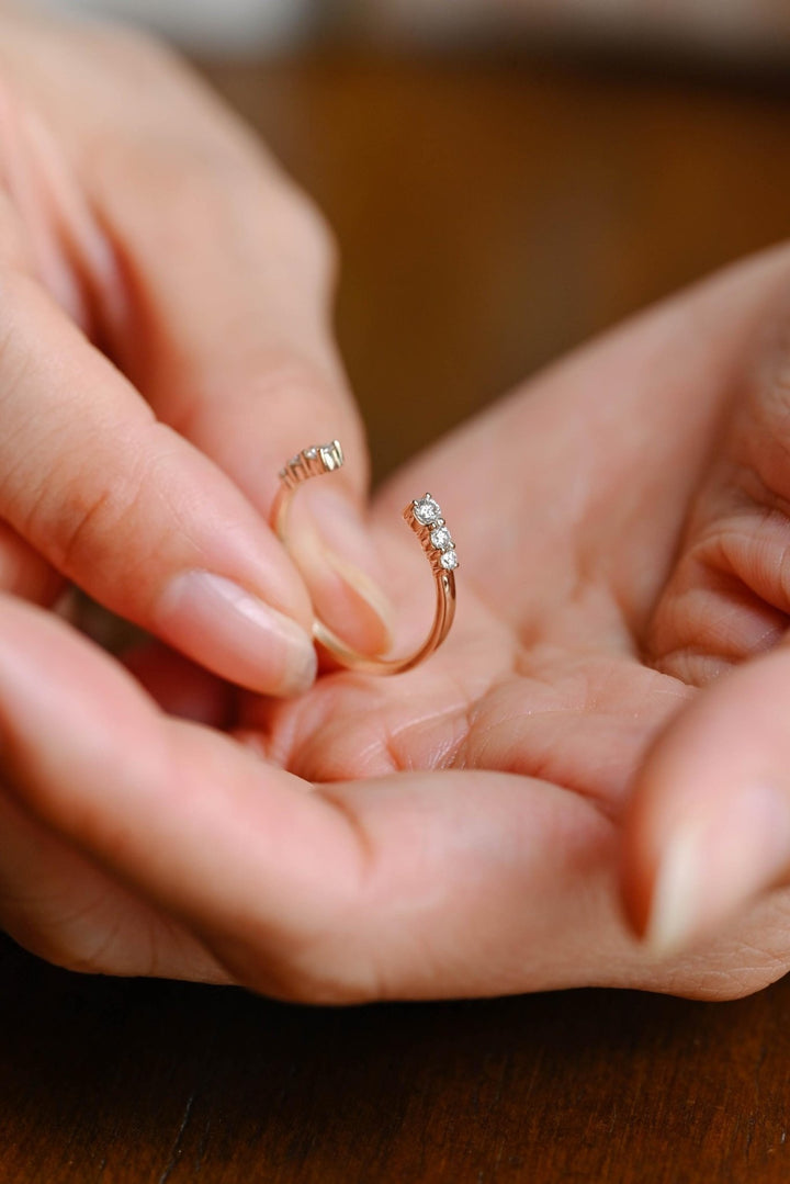 Round diamond band stacked with engagement ring