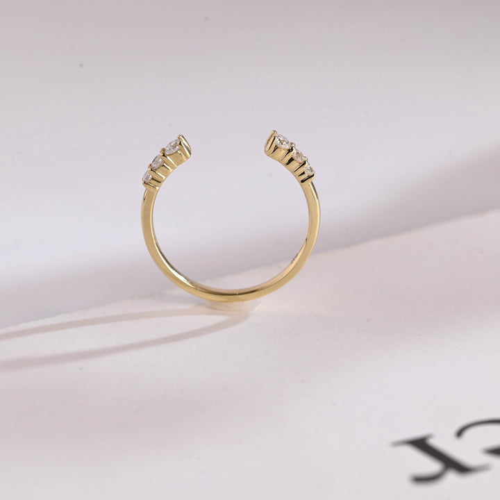 Round diamond wedding band in rose gold
