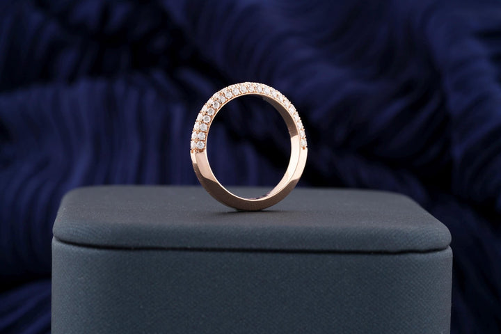 Round diamond band stacked with engagement ring