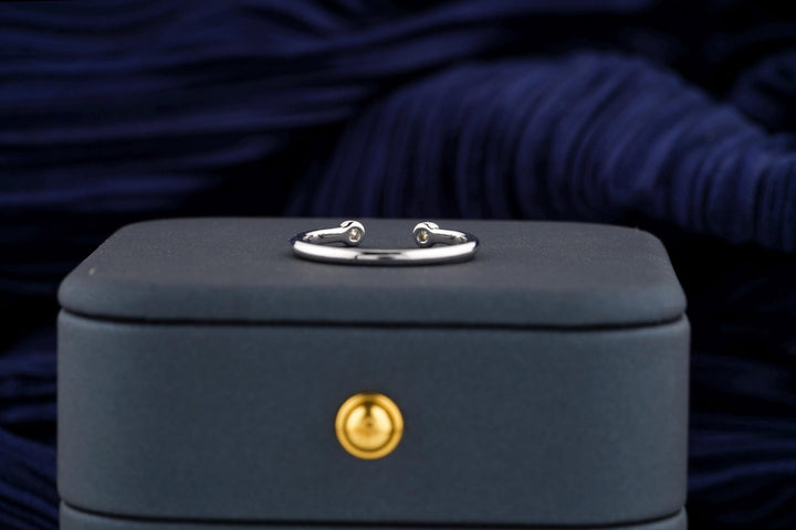 Round diamond band stacked with engagement ring