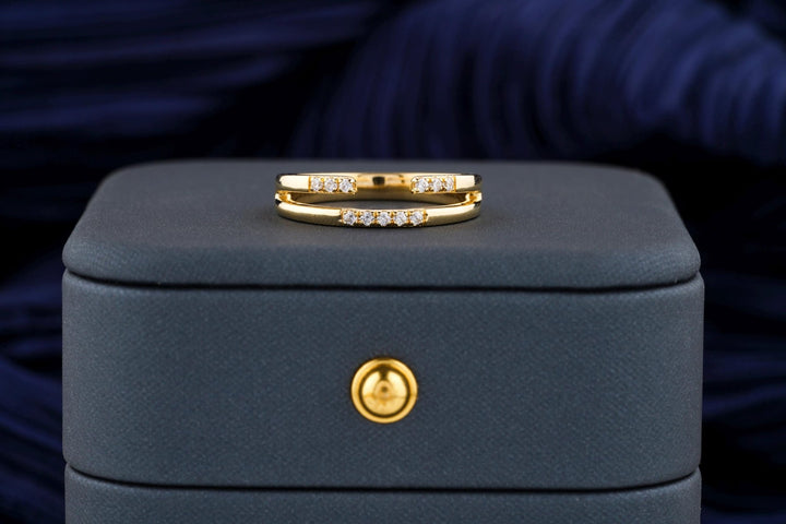Round diamond band stacked with engagement ring