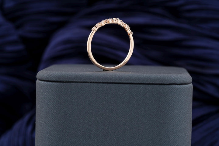 Round diamond band stacked with engagement ring
