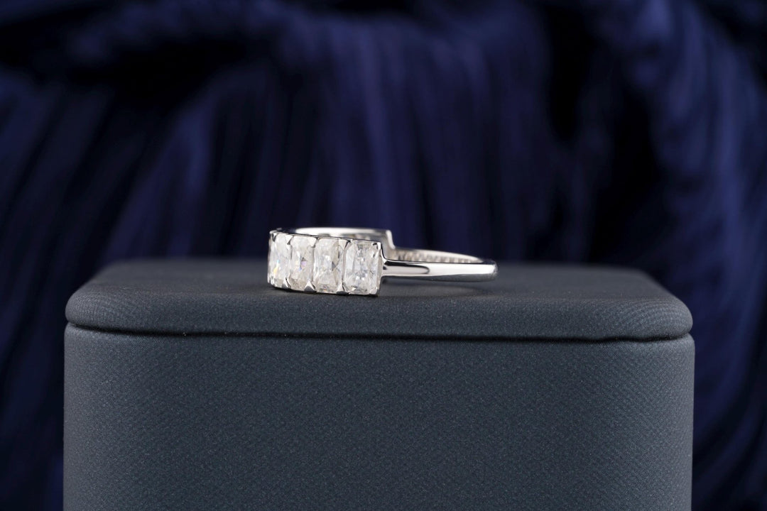 Radiant diamond band stacked with engagement ring