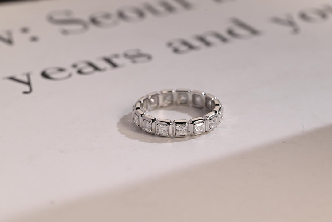 Princess diamond wedding band in yellow gold