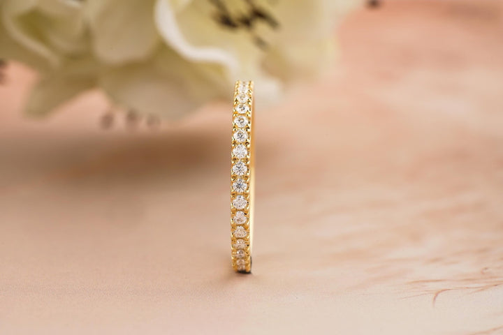 Ethically sourced round diamond eternity band